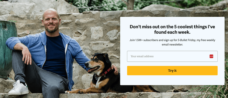 Tim Ferriss and his dog on his website home page