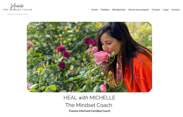 Michelle, a trauma-informed mindset coach, showcasing her coaching niche through a serene garden setting.