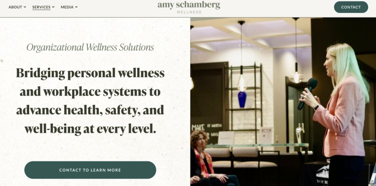 Amy Schamberg delivers a presentation on workplace wellness and organizational health solutions to a corporate audience.