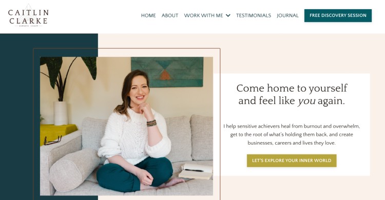 Portrait of coach Caitlin Clarke sitting on a couch, offering support to sensitive achievers as she helps their clients overcome burnout and reconnect with themselves.