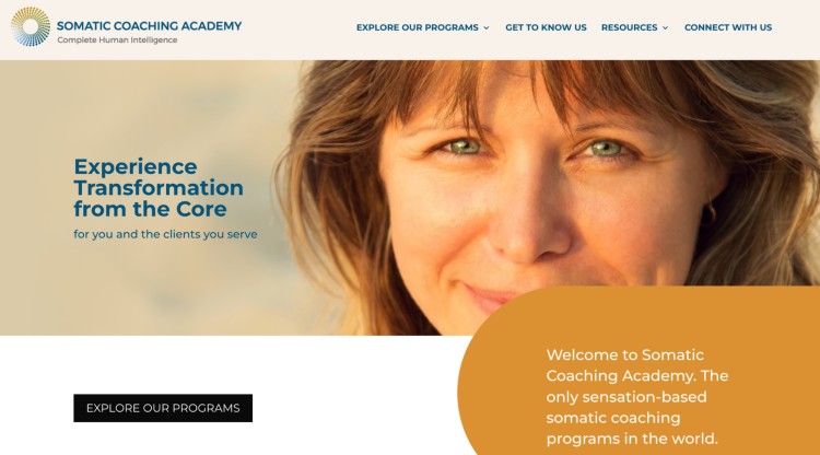 Homepage banner of the Somatic Coaching Academy showing a coach introducing sensation-based programs that provide students with immersive, practical learning and real hands-on experience.